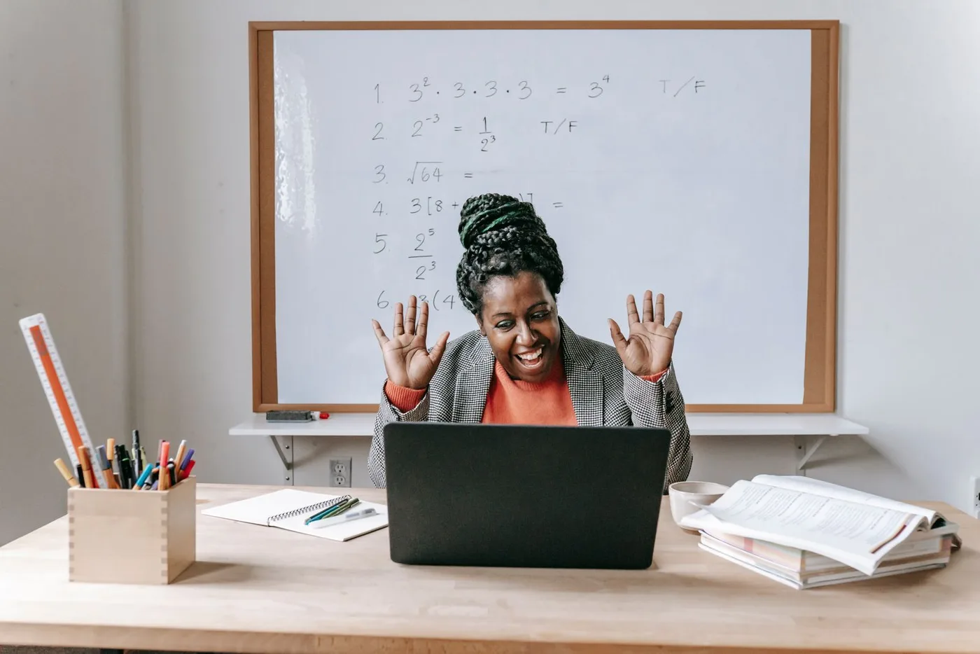 Educator teaching an online lesson from a classroom