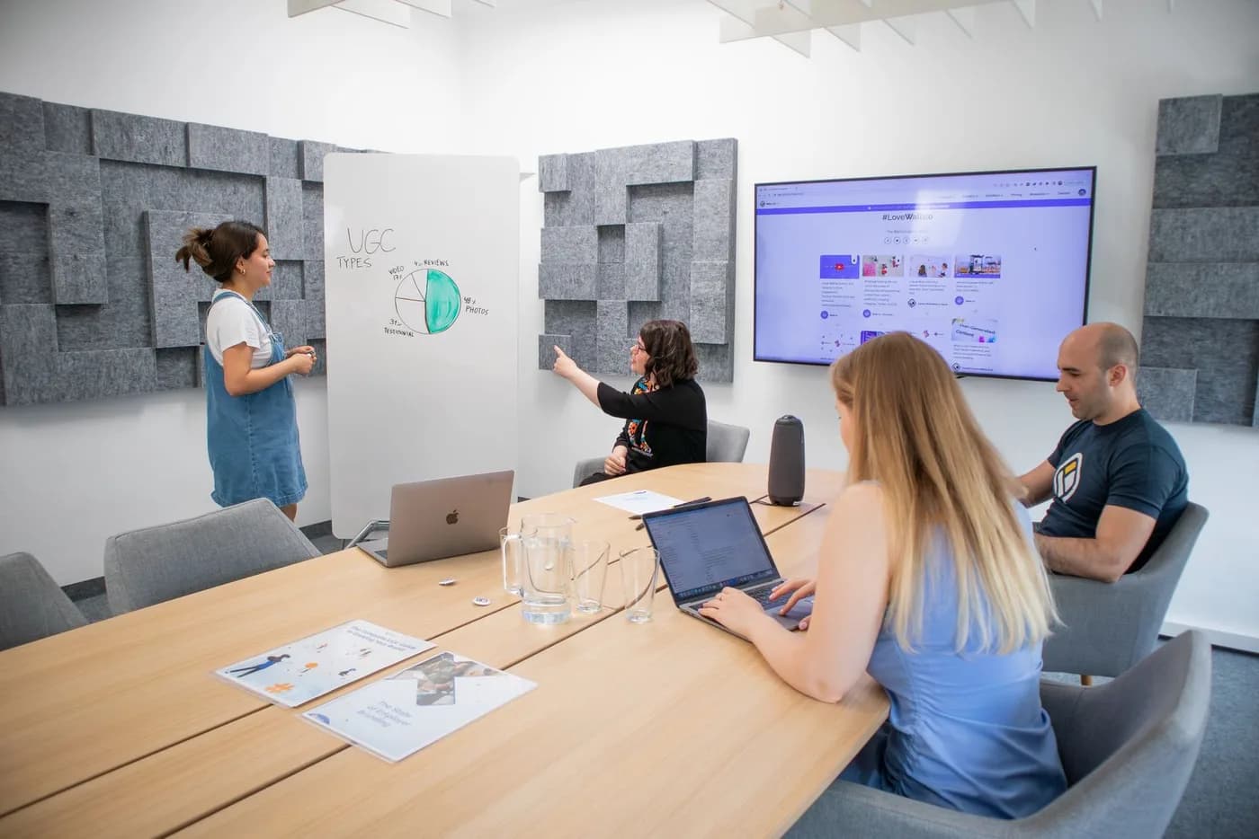 Marketing team reviewing a presentation together
